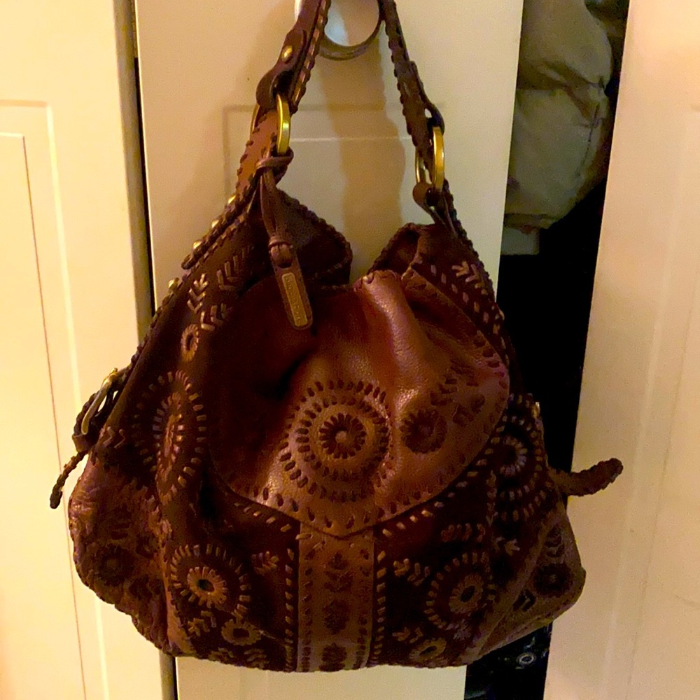 Boho supple large leather and suede Isabella Fiora shoulder bag.  Snap closure.